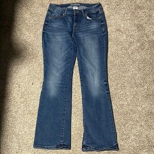 Classic Blue Boot Cut Jeans with Subtle Fading